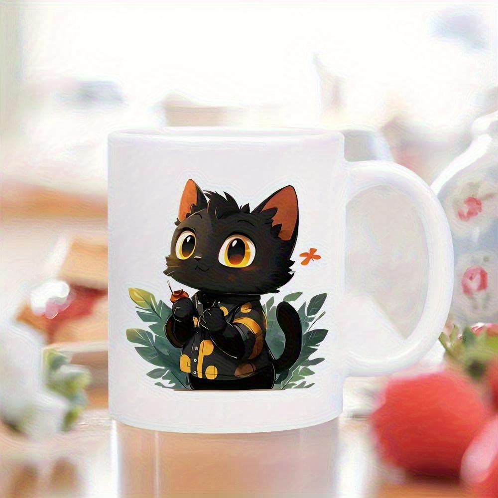 Tailorly White Ceramic 11 oz Mug - Adorable Black Kitten Wearing Patterned Vest Resting Among Lush Green Leaves Cat