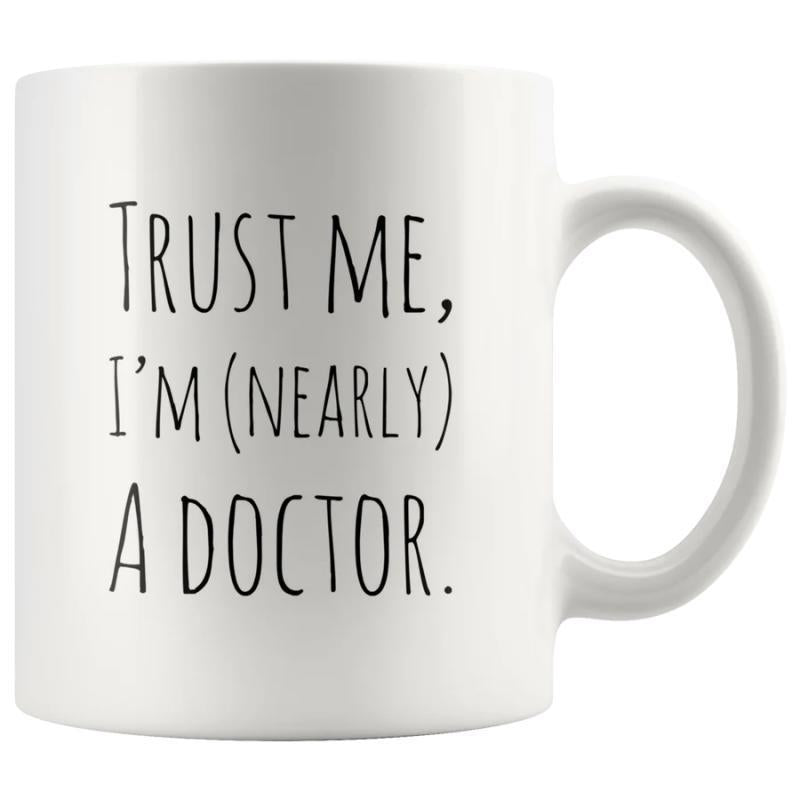 Tailorly White Ceramic 11 oz Mug - Trust Me Im Nearly A Doctor Simple Hand Drawn Black Lettering Set Against A Minimalist Canvas Typography