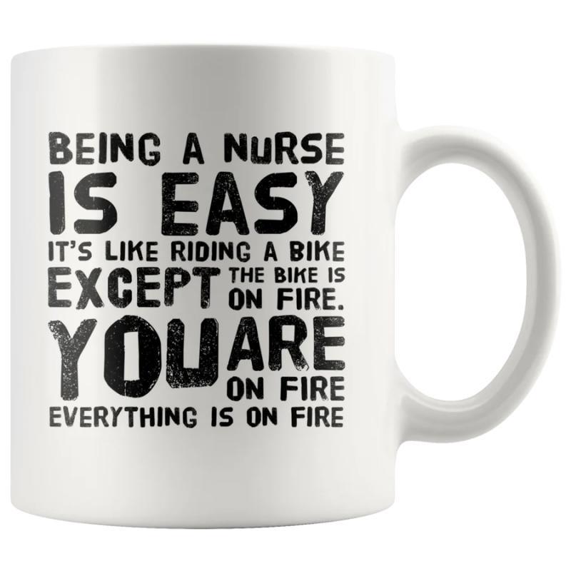 Tailorly White Ceramic 11 oz Mug - Being A Nurse Is Easy It's Like Riding A Bike Except The Bike Is On Fire You Are On Fire Everything Is On Fire Bold Distressed