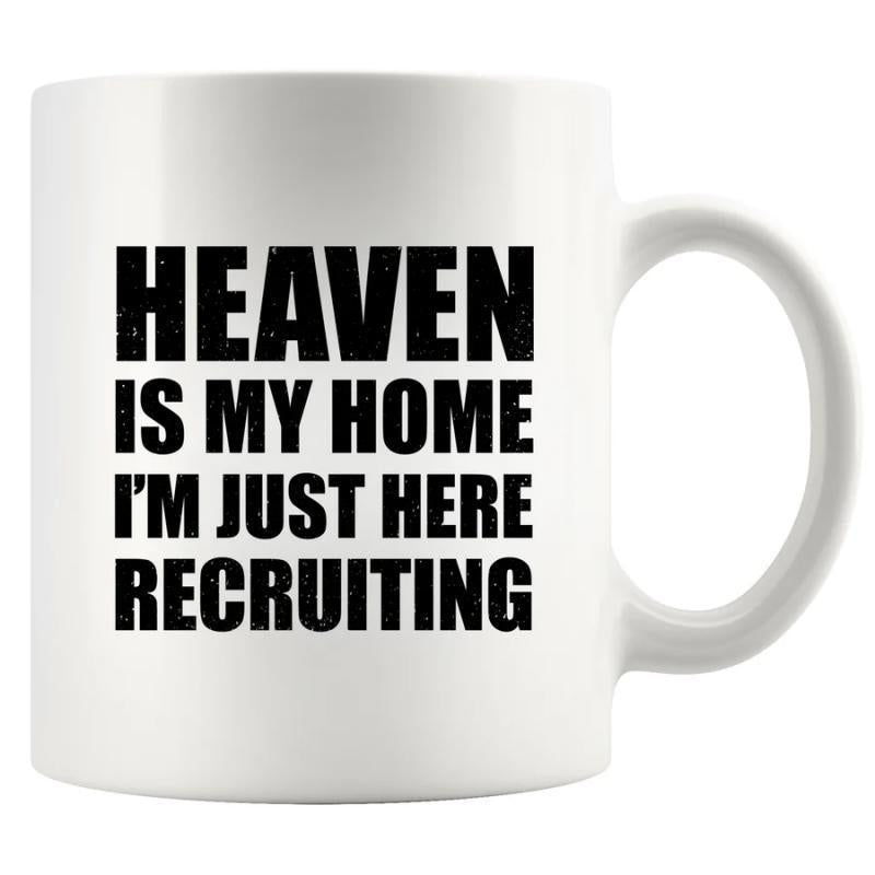Tailorly White Ceramic 11 oz Mug - Heaven Is My Home Im Just Here Recruiting Simple Bold Black Lettering Centered On A Minimalist Ceramic Surface Statement