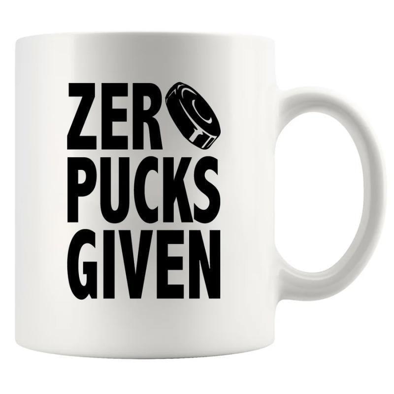 Tailorly White Ceramic 11 oz Mug - Zero Pucks Given Bold Condensed Black Typography Featuring A Tilted Cylindrical Athletic Ice Hockey Puck