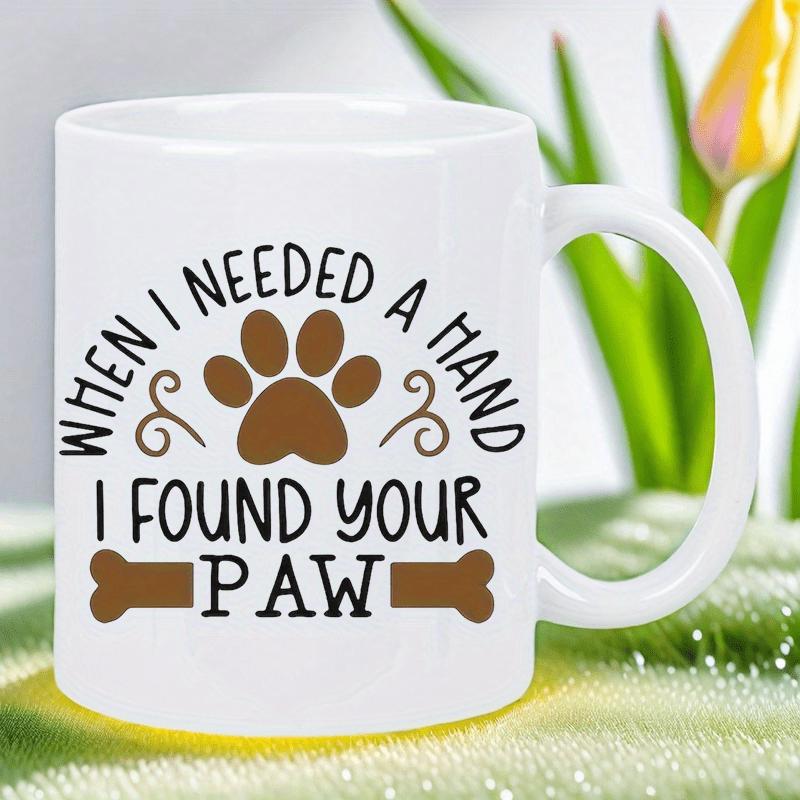 Tailorly White Ceramic 11 oz Mug - When I Needed A Hand I Found Your Paw Simple Brown Paw Print Floating Above A Long Narrow Bone Paw