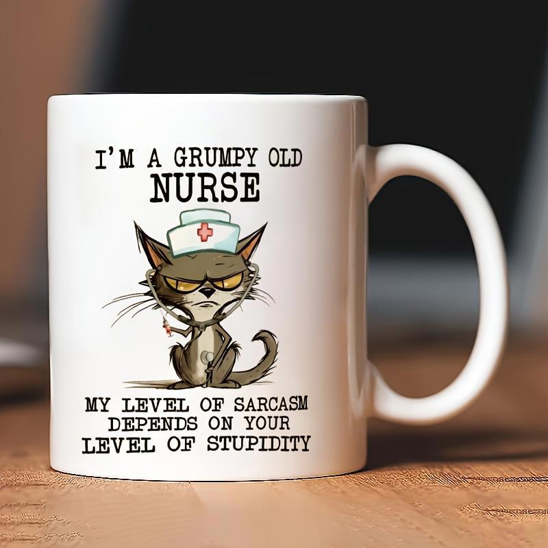 Tailorly White Ceramic 11 oz Mug - Im A Grumpy Old Nurse My Level Of Sarcasm Depends On Your Level Of Stupidity Grumpy Cartoon Feline Wearing Nurse Hat Holding