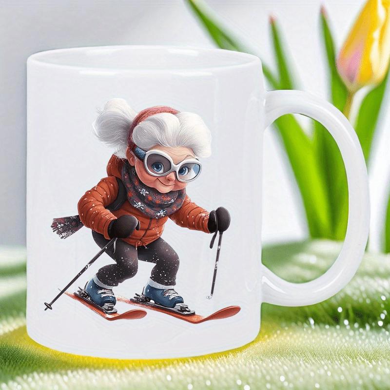 Tailorly White Ceramic 11 oz Mug - Sporty Elderly Lady In Orange Jacket Skiing Down Snowy Slopes Grandmother