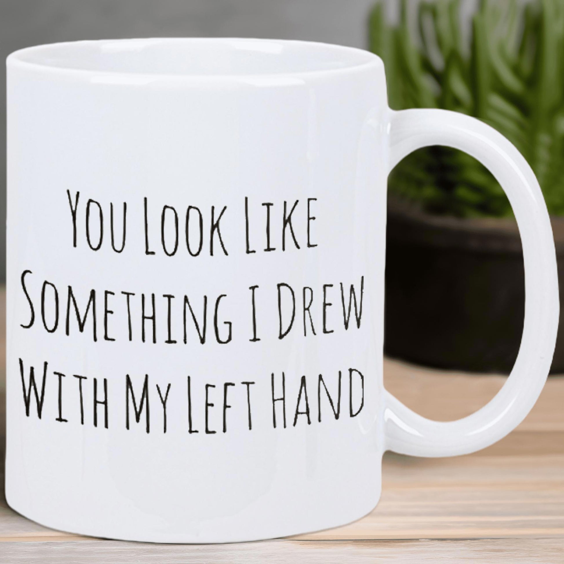 Tailorly White Ceramic 11 oz Mug - You Look Like Something I Drew With My Left Hand Sarcastic Quote Script Displayed On A Clean White Background Surface Mug