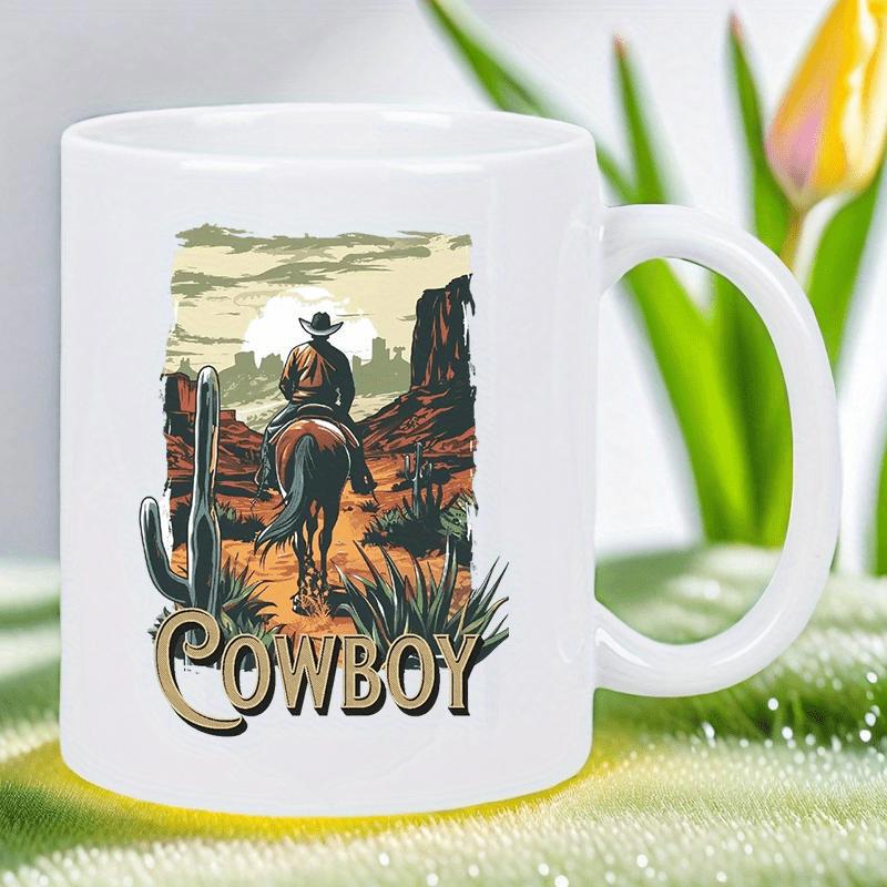 Tailorly White Ceramic 11 oz Mug - Cowboy Riding Through A Sunset Desert Landscape With Cactus And Rocky Mesas Cowboy