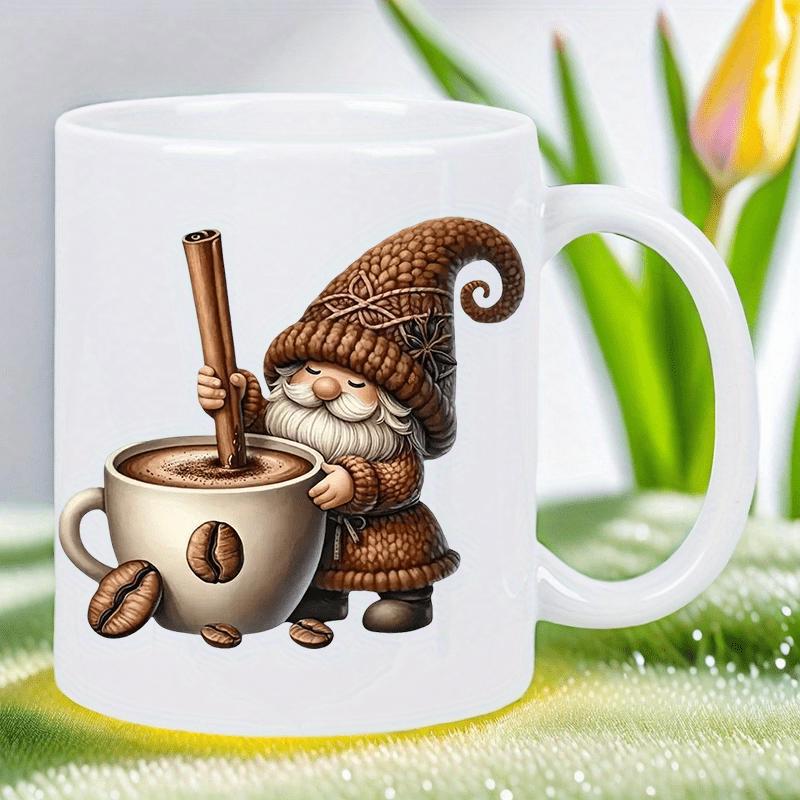 Tailorly White Ceramic 11 oz Mug - Charming Knitted Character Stirring Hot Coffee Among Scattered Fragrant Coffee Beans Gnome