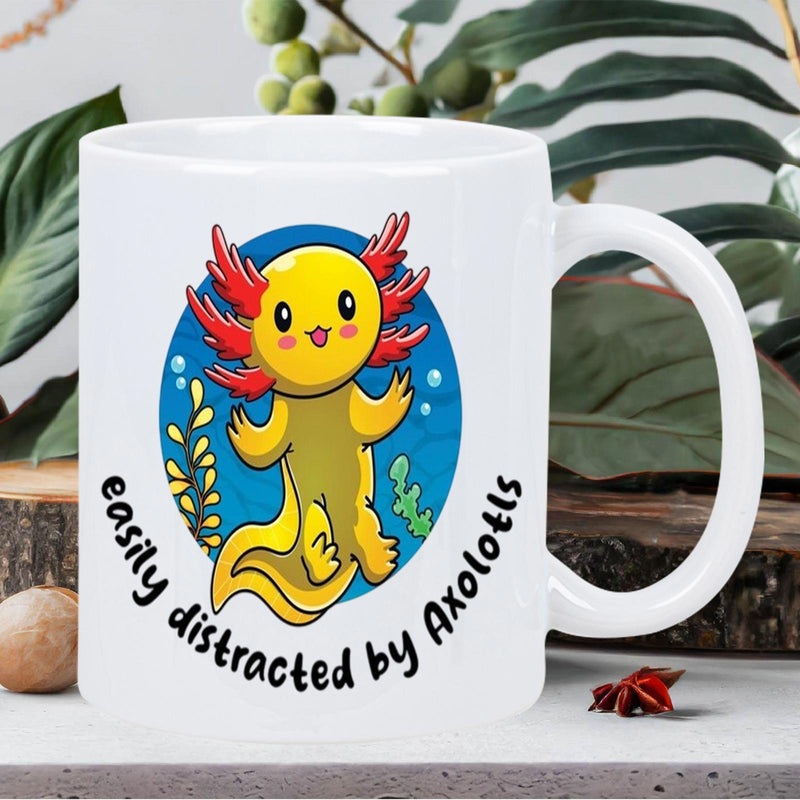 Tailorly White Ceramic 11 oz Mug - Easily Distracted By Axolotls Adorable Yellow Cartoon Creature Swimming Inside Vibrant Blue Circular Bubble Axolotl