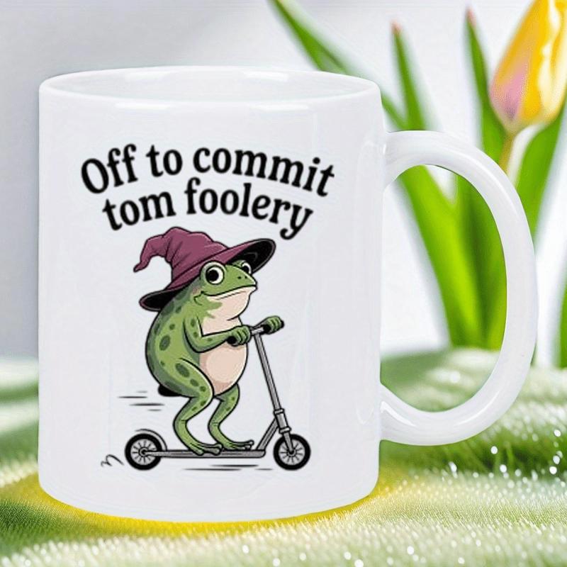 Tailorly White Ceramic 11 oz Mug - Off To Commit Tom Foolery Whimsical Green Frog Wearing Purple Wizard Hat Riding Scooter Frog