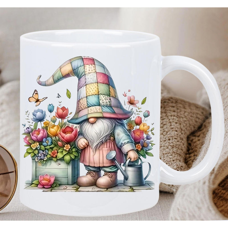 Tailorly White Ceramic 11 oz Mug - Colorful Garden Gnome Wearing Patchwork Hat Watering Vibrant Spring Flowers Among Butterfly Gnome