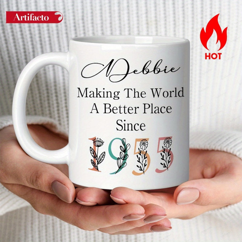 Tailorly White Ceramic 11 oz Mug - Debbie Making The World A Better Place Since 1955 Elegant Minimalist Ceramic Vessel Featuring Delicate Floral Numbers And