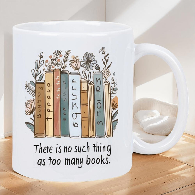 Tailorly White Ceramic 11 oz Mug - There Is No Such Thing As Too Many Books Vintage Style Spines Standing Among Delicate Hand Drawn Floral Accents Books
