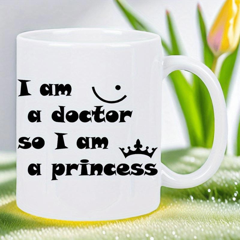 Tailorly White Ceramic 11 oz Mug - I Am A Doctor So I Am A Princess Minimalist White Ceramic With Playful Typography Featuring A Tiny Crown And Smile Mug