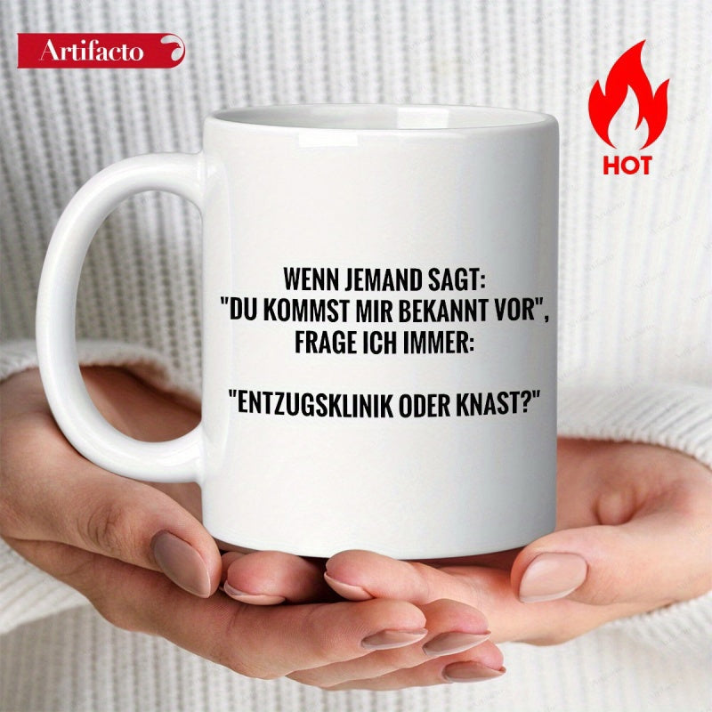 Tailorly White Ceramic 11 oz Mug - Sleek Held By Human Hands Against Soft Fabric Mug