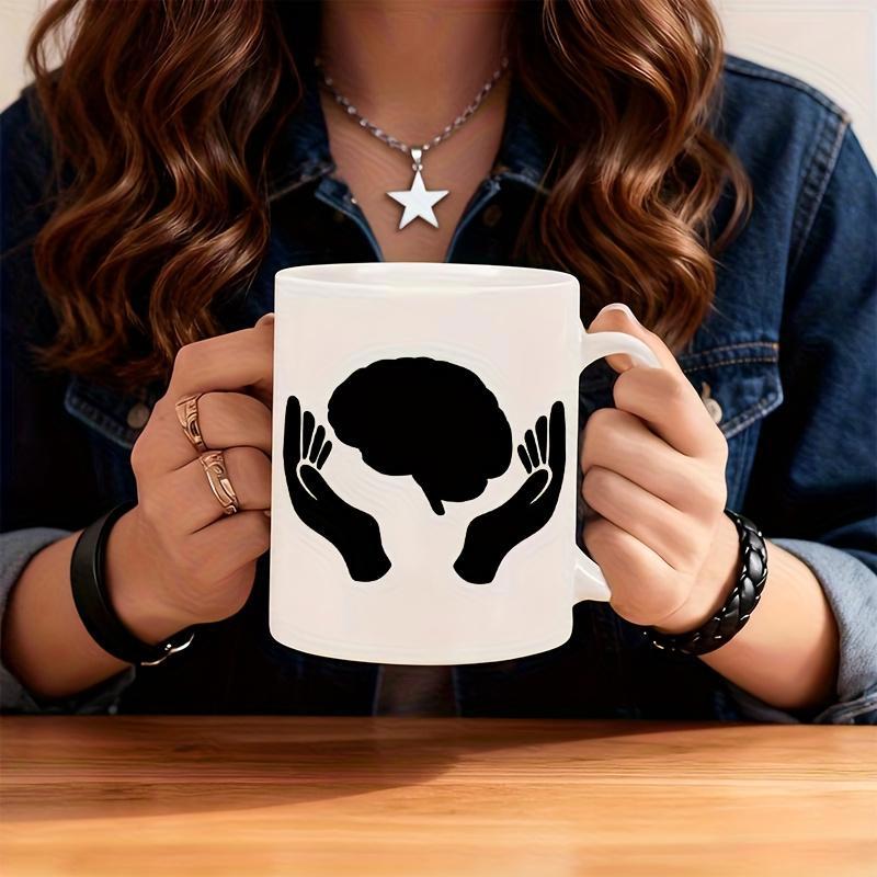 Tailorly White Ceramic 11 oz Mug - Minimalist Black Silhouette Of Human Hands Cradling A Symbolic Human Brain