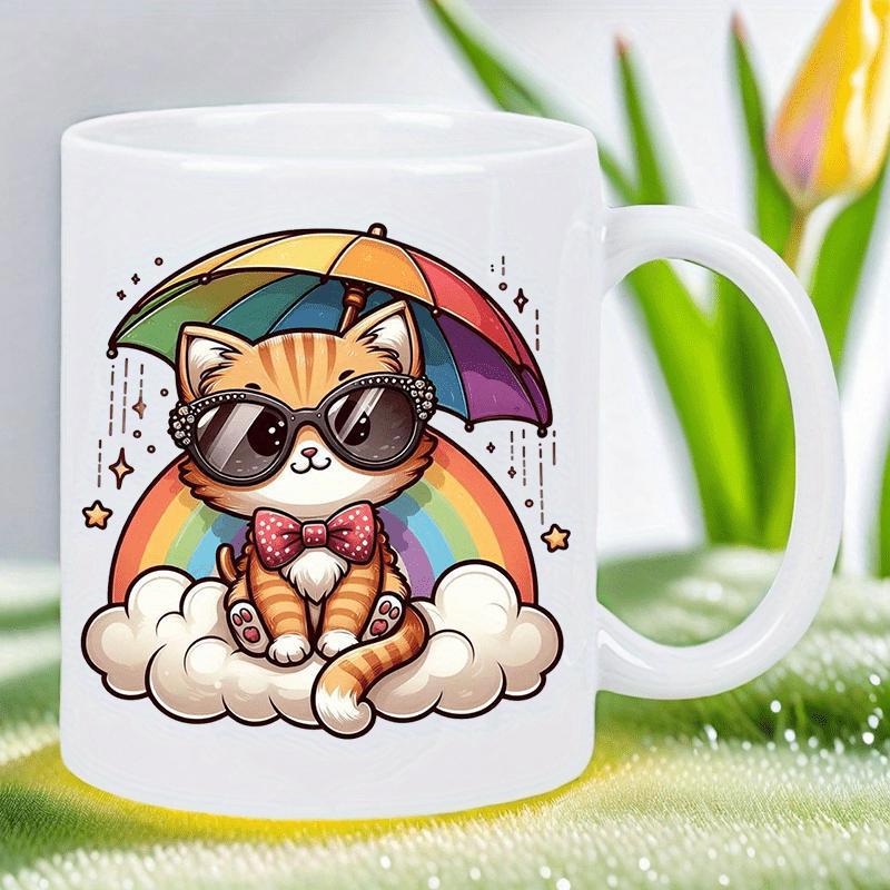 Tailorly White Ceramic 11 oz Mug - Cute Tabby Wearing Sunglasses Under A Vibrant Rainbow Umbrella On Soft Cloud Cat