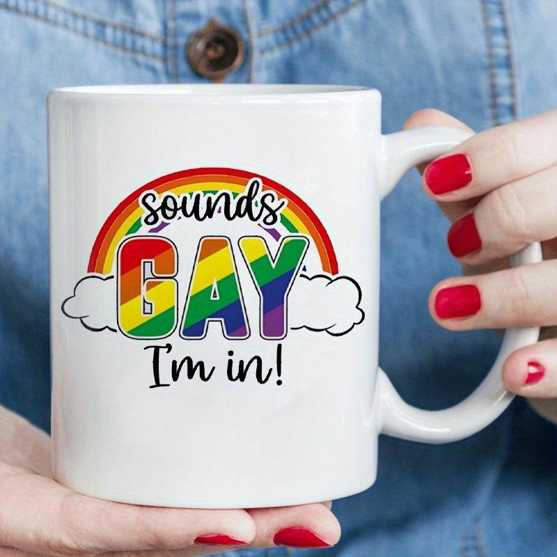 Tailorly White Ceramic 11 oz Mug - Sounds Gay Im In Vibrant Colorful Arc Resting Upon Fluffy Clouds With Bold Striped Letters Rainbow