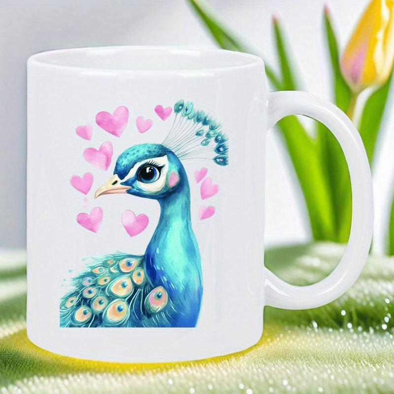 Tailorly White Ceramic 11 oz Mug - Vibrant Blue Bird With Pink Hearts Floating In The Air Peacock
