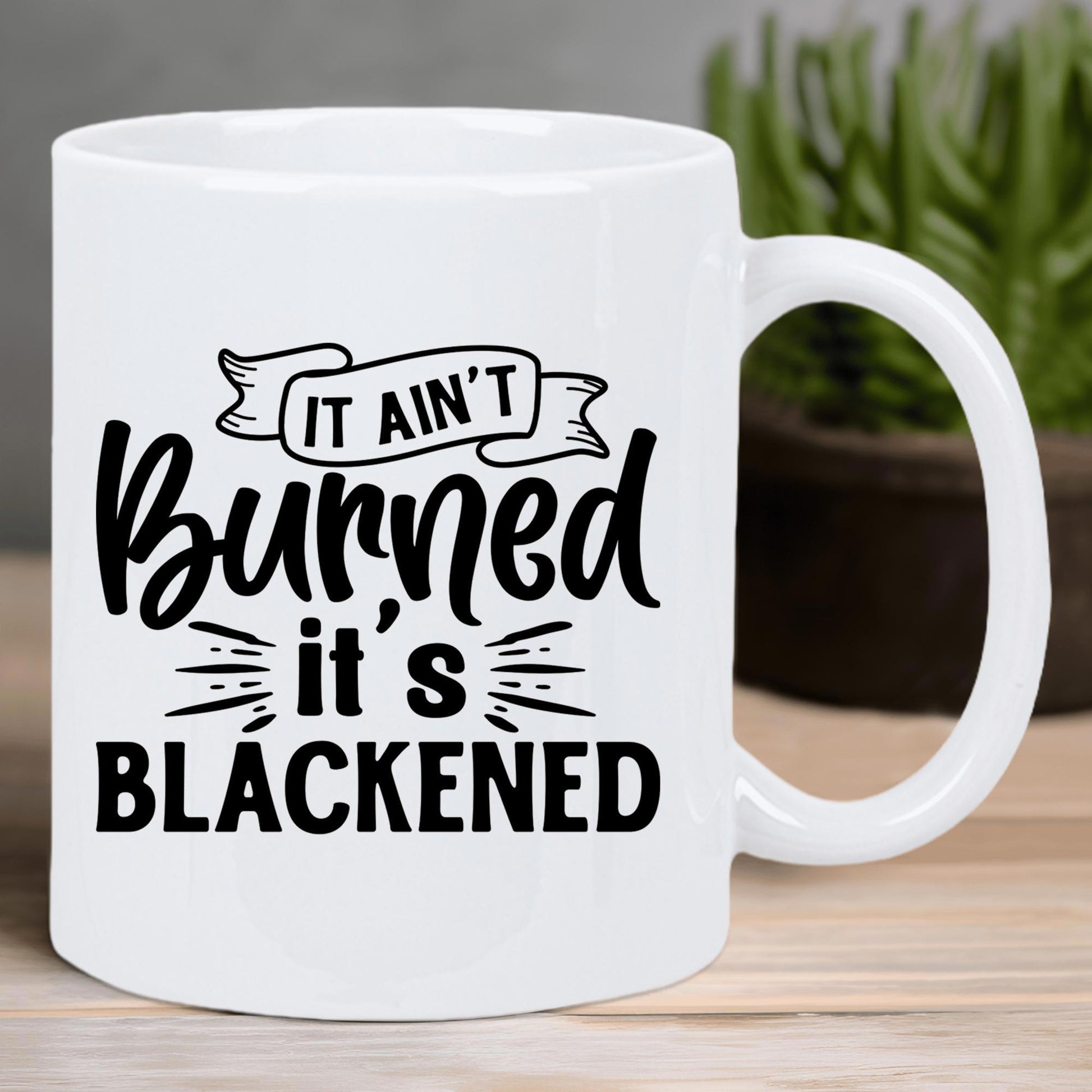 Tailorly White Ceramic 11 oz Mug - It Ain't Burned It's Blackened Stylized Decorative Ribbon Banner With Modern Bold Script Typography Mug