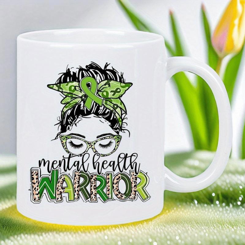 Tailorly White Ceramic 11 oz Mug - Mental Health Warrior Messy Bun Silhouette Wearing Green Ribbon And Leopard Patterned Glasses Woman