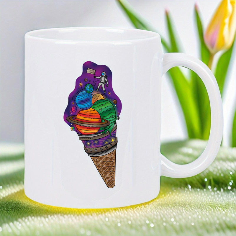 Tailorly White Ceramic 11 oz Mug - Vibrant Planets And Floating Astronaut Nested Inside A Crispy Waffle Cone Ice Cream