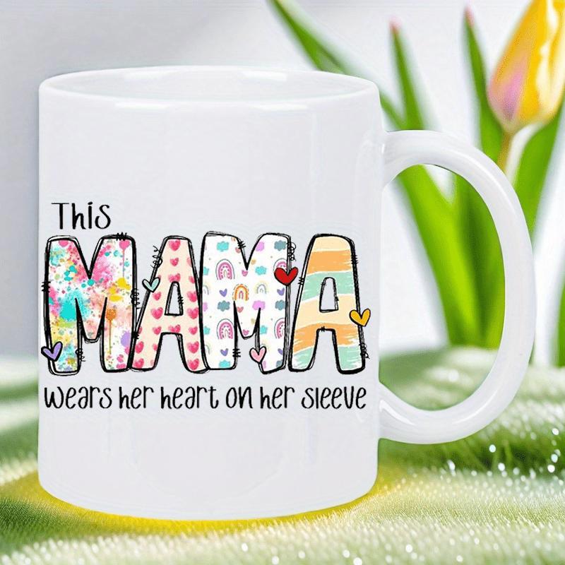 Tailorly White Ceramic 11 oz Mug - This Mama Wears Her Heart On Her Sleeve Artistic Colorful Patterns With Rainbows Flowers And Decorative Hearts Bold Lettering