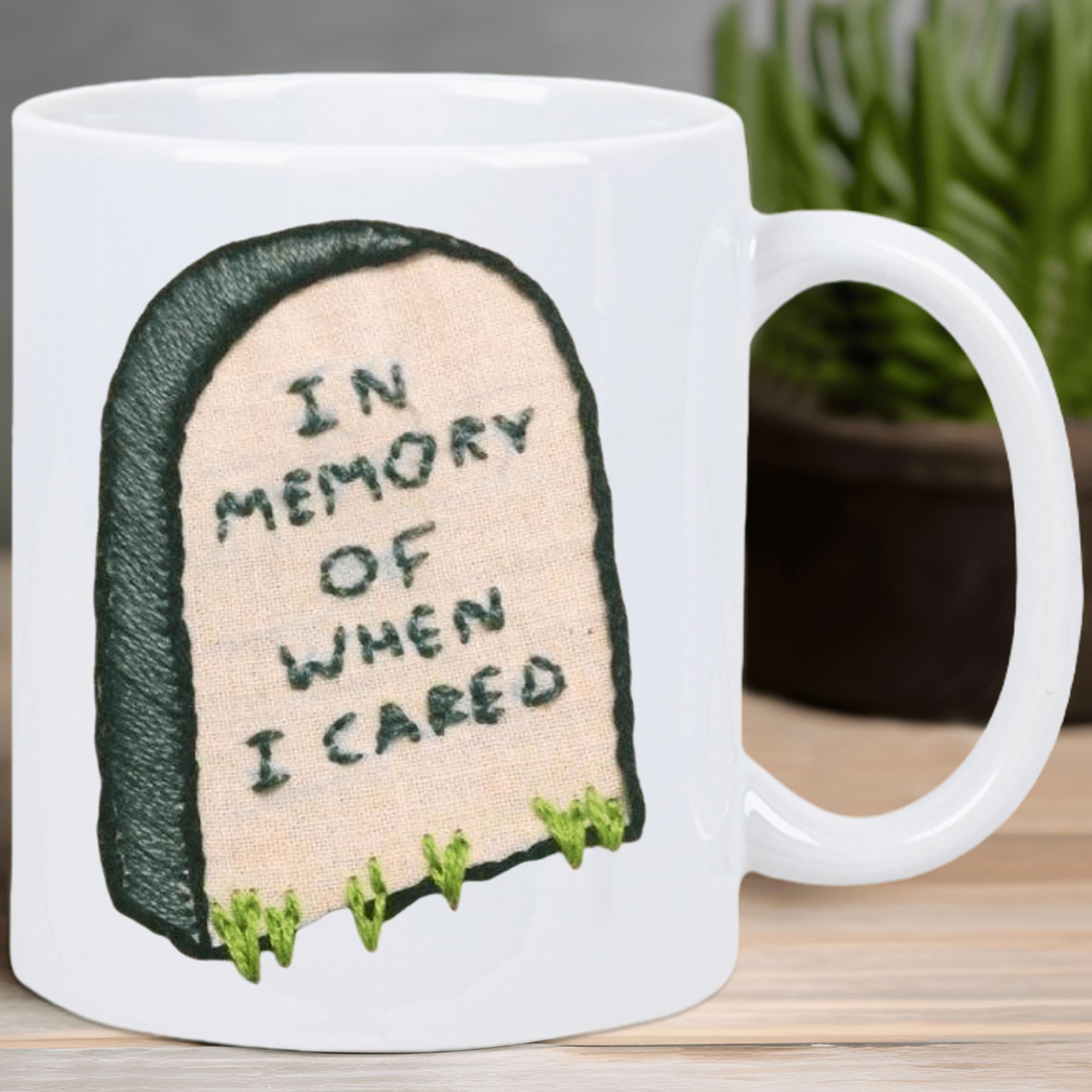 Tailorly White Ceramic 11 oz Mug - In Memory Of When I Cared Minimalist Cartoon Tombstone Surrounded By Small Green Grass Sprigs Tombstone