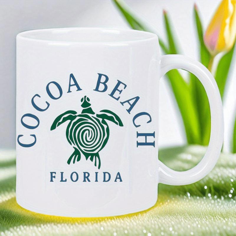 Tailorly White Ceramic 11 oz Mug - Cocoa Beach Florida Stylized Green Sea Turtle With Intricate Spiral Shell Patterns Swimming Amidst Coastal Atmosphere Turtle