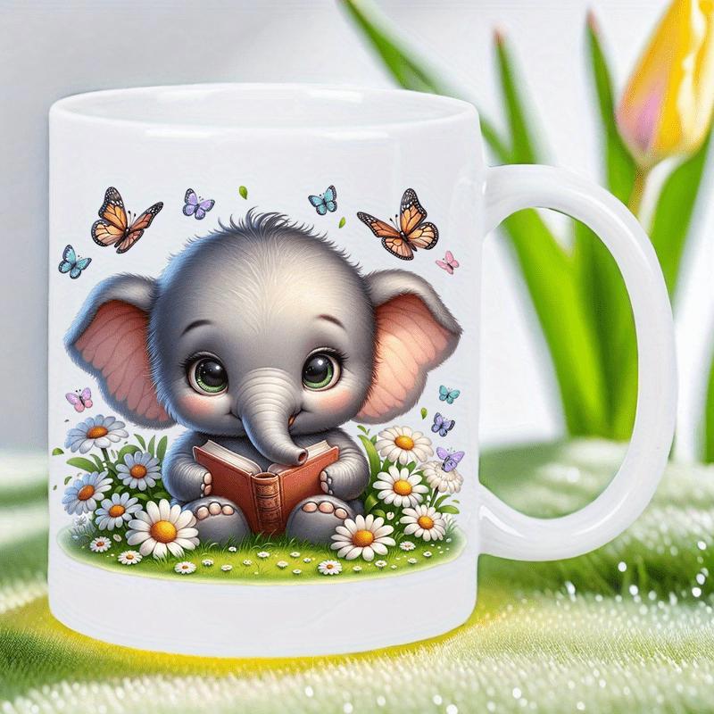 Tailorly White Ceramic 11 oz Mug - Adorable Little Elephant Reading Book Among Daisies Under Flying Colorful Butterflies Elephant