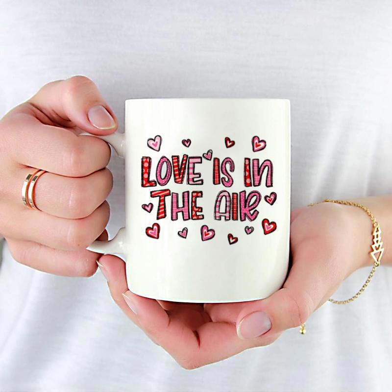 Tailorly White Ceramic 11 oz Mug - Love Is In The Air Decorative Red Patterned Letters Surrounded By Numerous Tiny Heart