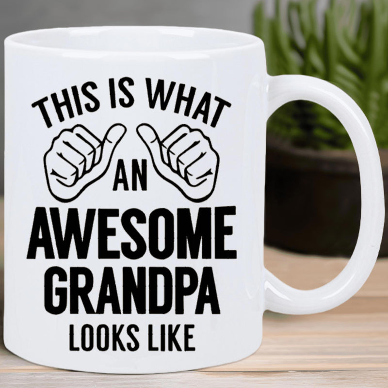 Tailorly White Ceramic 11 oz Mug - This Is What An Awesome Grandpa Looks Like Minimalist Black Line Art Showing Two Hands With Thumbs Pointing Inward Mug
