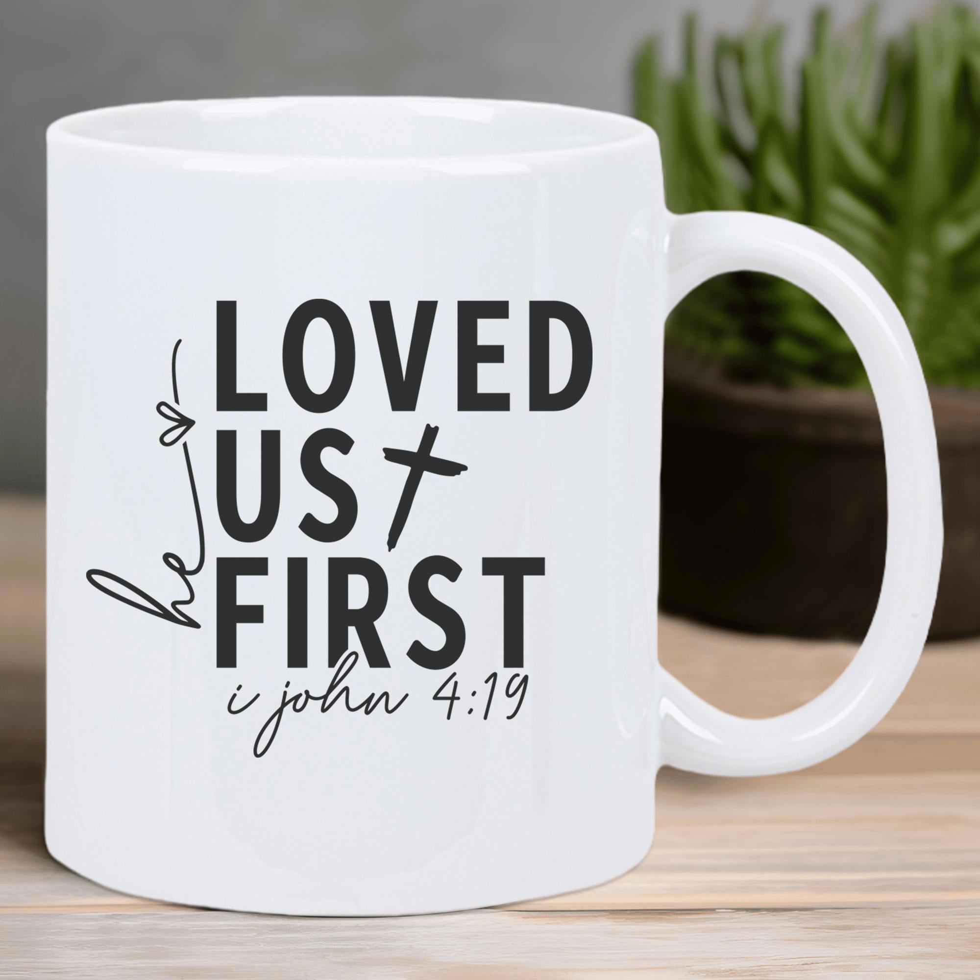 Tailorly White Ceramic 11 oz Mug - He Loved Us First 1 John 4 19 Clean Minimalist Typography Style With Small Christian Faith Symbol Symbolic Divine Cross