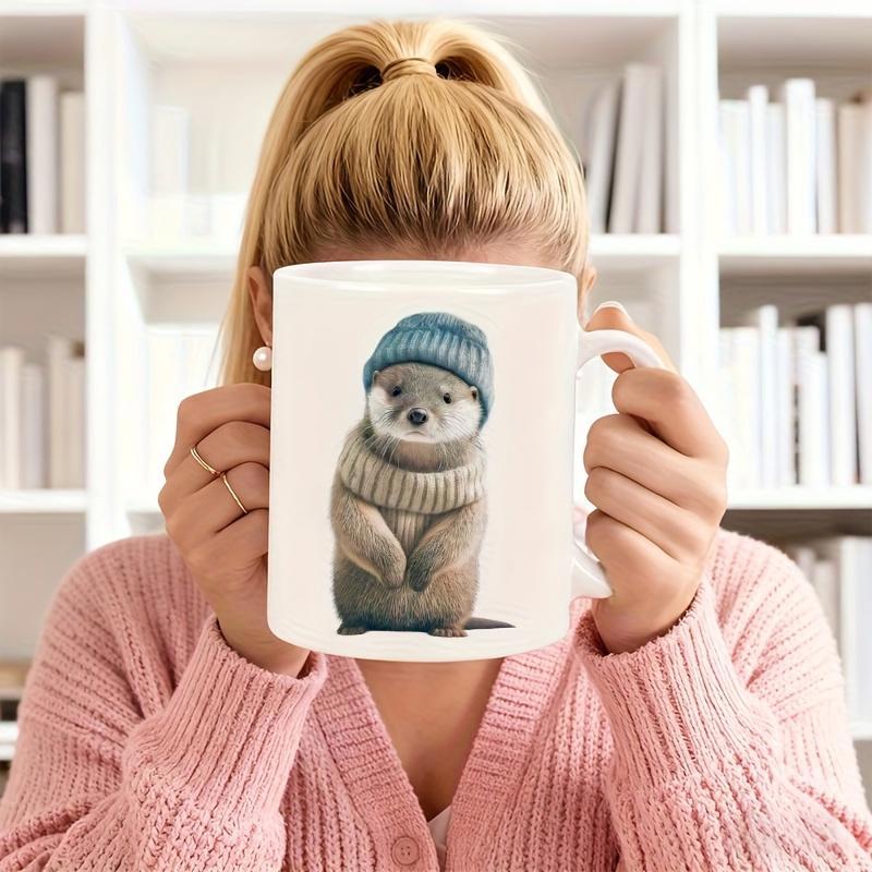 Tailorly White Ceramic 11 oz Mug - Adorable Small Mammal Wearing Blue Knitted Beanie And Cozy Winter Sweater Otter