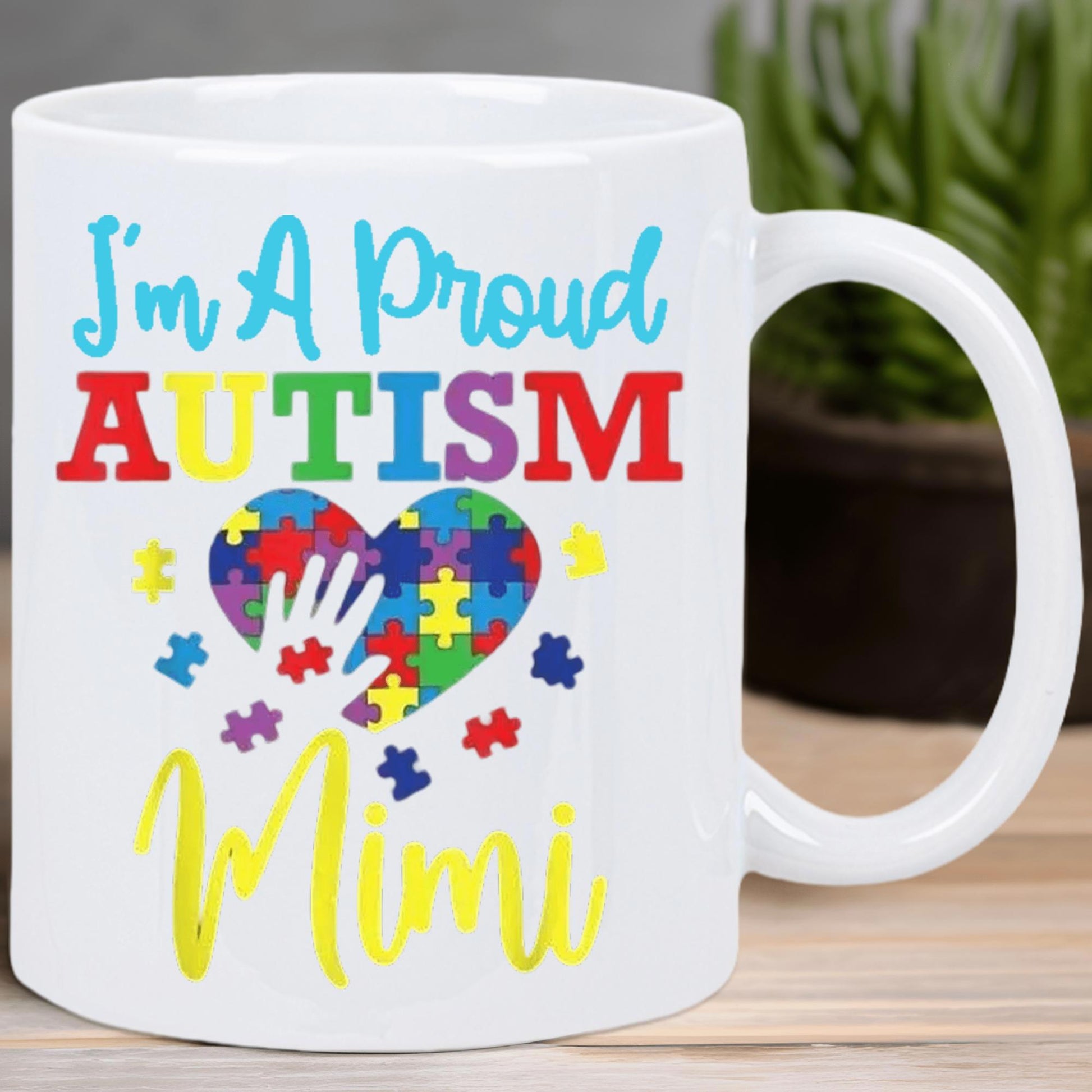 Tailorly White Ceramic 11 oz Mug - Im A Proud Autism Mimi Colorful Puzzle Pieces Arranged In A Heart Under A Handprint Heart
