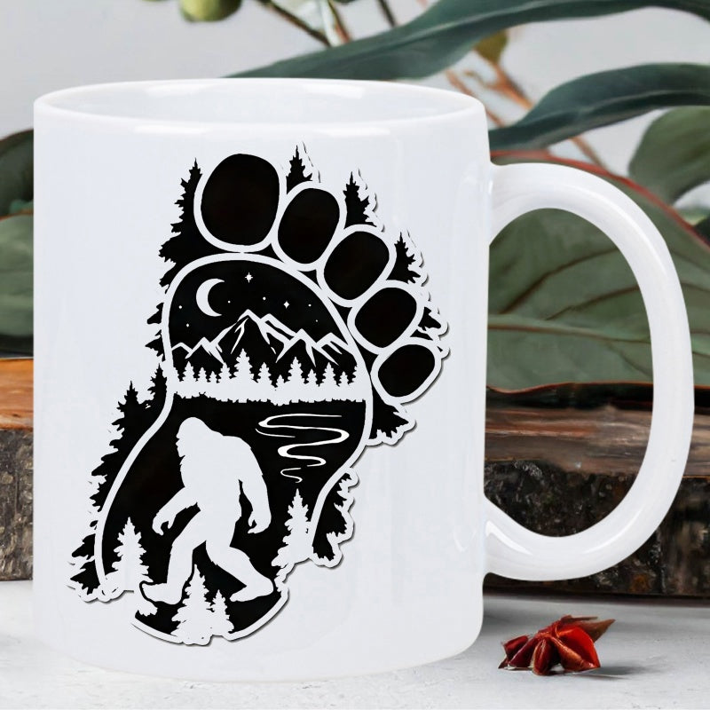Tailorly White Ceramic 11 oz Mug - Majestic Sasquatch Walking Through Evergreen Forest Under Crescent Moonlit Night Footprint