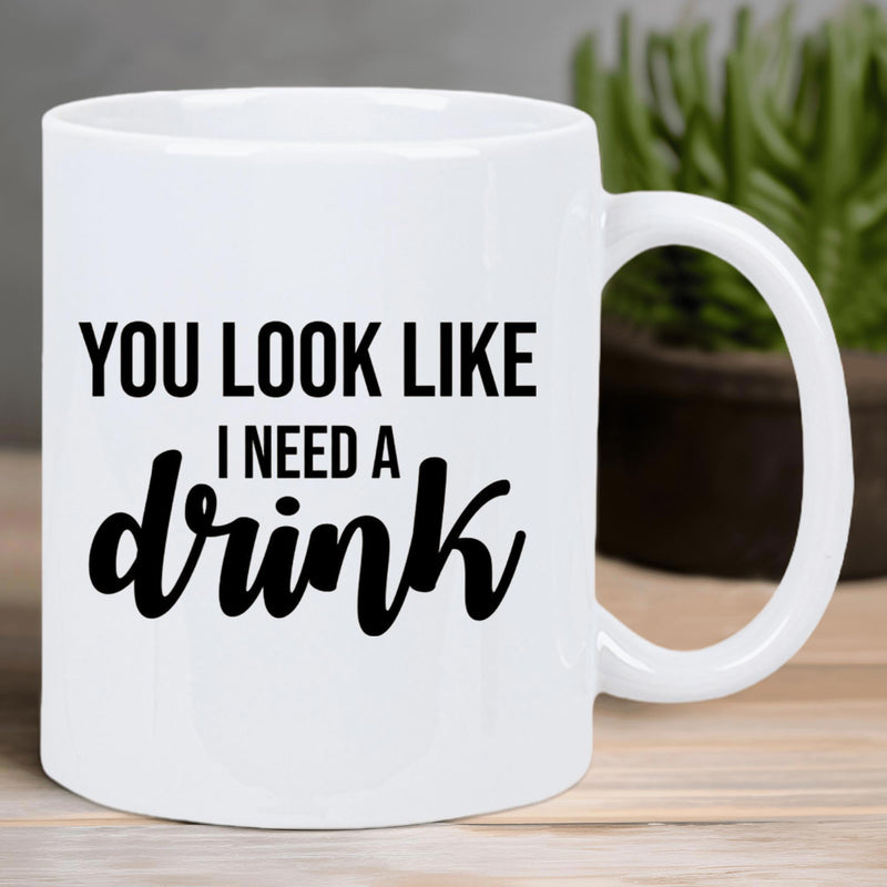 Tailorly White Ceramic 11 oz Mug - You Look Like I Need A Drink Simple White Ceramic Vessel Featuring Bold Black Typography And Elegant Script Mug