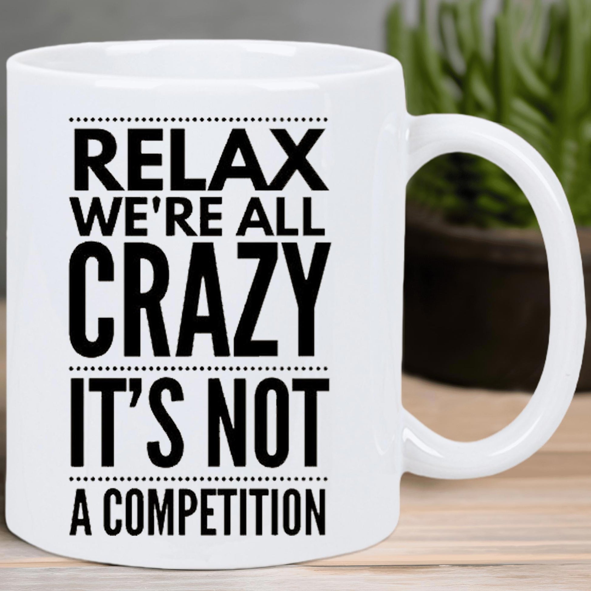 Tailorly White Ceramic 11 oz Mug - Relax We're All Crazy It's Not A Competition Bold Black Sans Serif Lettering Arranged Between Simple Dotted Lines Mug