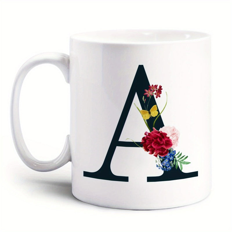 Tailorly White Ceramic 11 oz Mug - A Elegant Black Serif Alphabet Character With Colorful Blooming Floral Patterns Initial