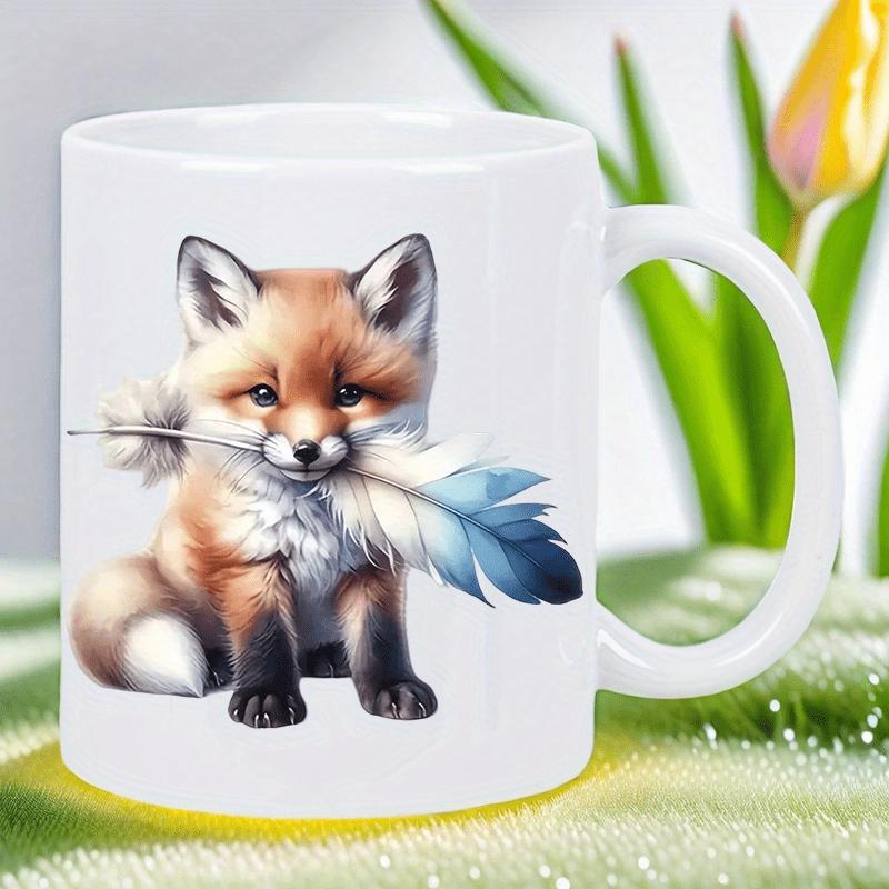 Tailorly White Ceramic 11 oz Mug - Adorable Baby Fox Sitting Calmly Holding A Soft Blue Decorative Feather Fox