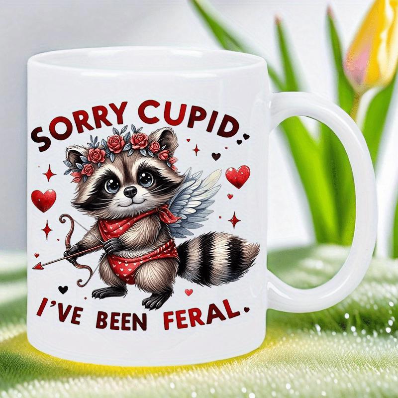 Tailorly White Ceramic 11 oz Mug - Sorry Cupid I've Been Feral Adorable Cartoon Raccoon Holding A Bow With Tiny Wings And Hearts Raccoon