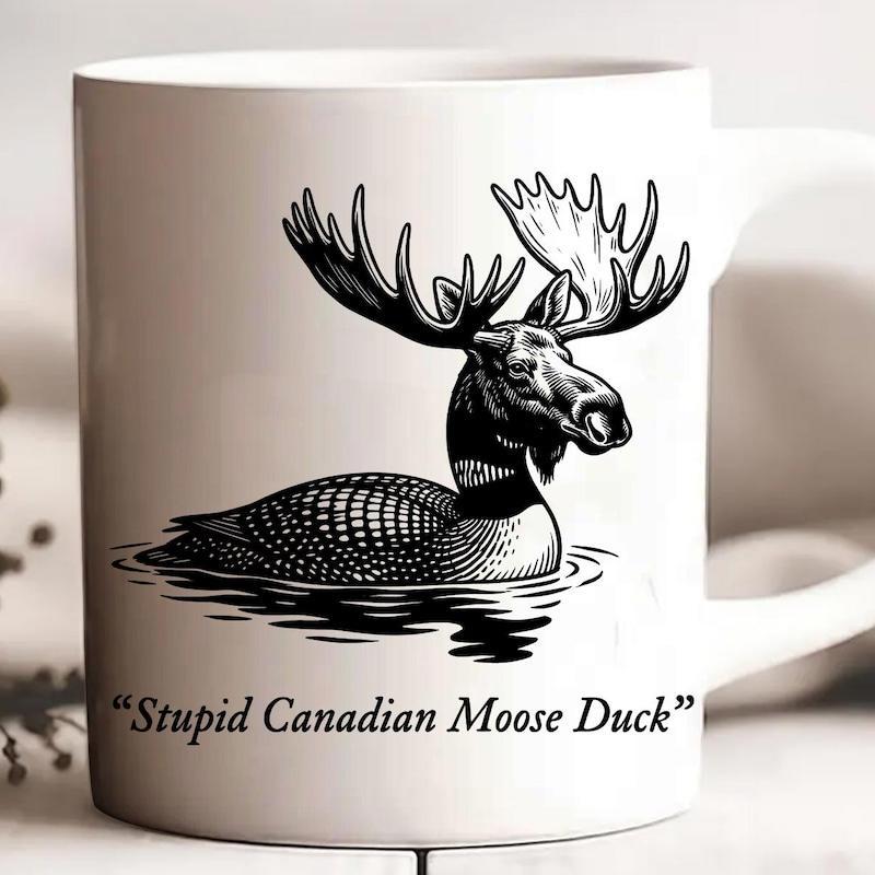 Tailorly White Ceramic 11 oz Mug - Stupid Canadian Moose Duck Hand Drawn Vintage Style Hybrid Creature Swimming On Calm Rippling Water Surface Moose Duck