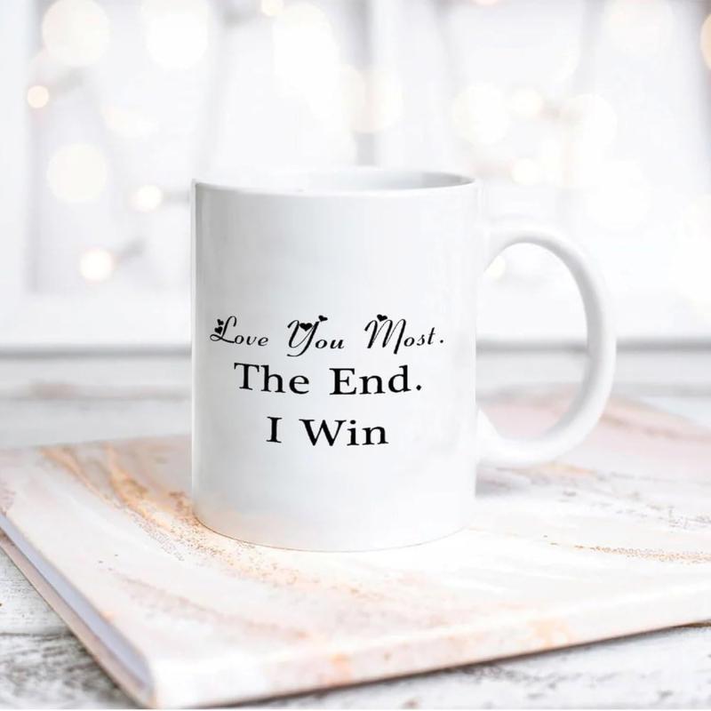 Tailorly White Ceramic 11 oz Mug - Love You Most The End I Win Elegant Ceramic Coffee Container Standing On Marble Surface With Blurred Lights Mug