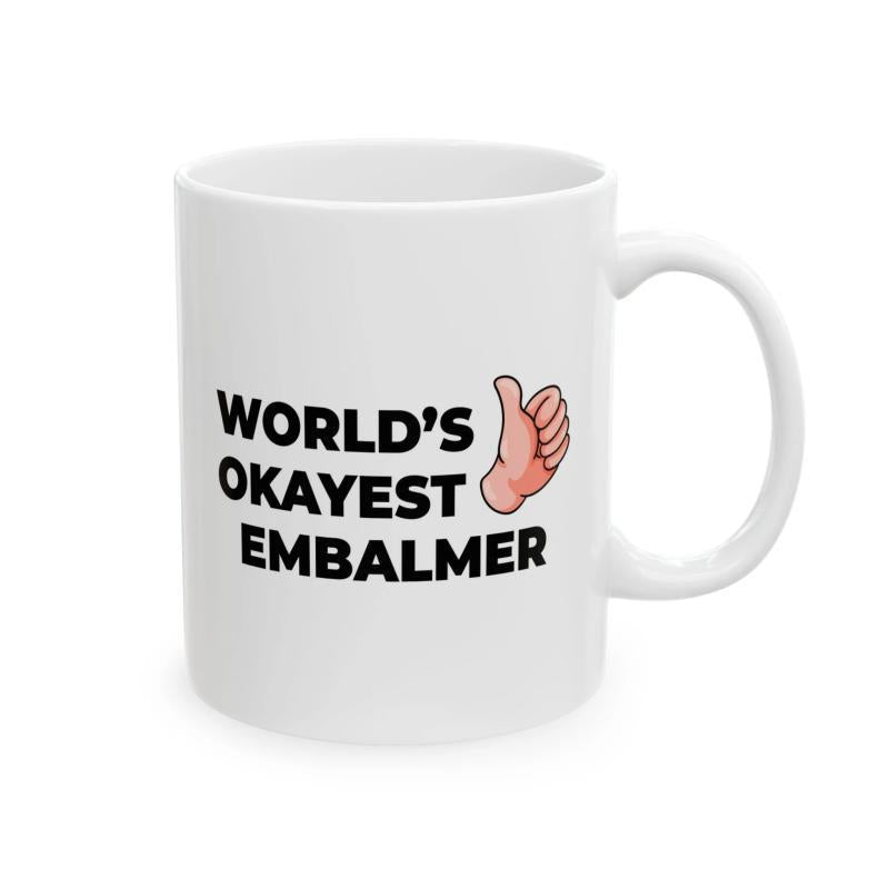 Tailorly White Ceramic 11 oz Mug - Worlds Okayest Embalmer Simple Bold Black Lettering Beside A Cartoon Flesh Toned Hand Gesture Mug