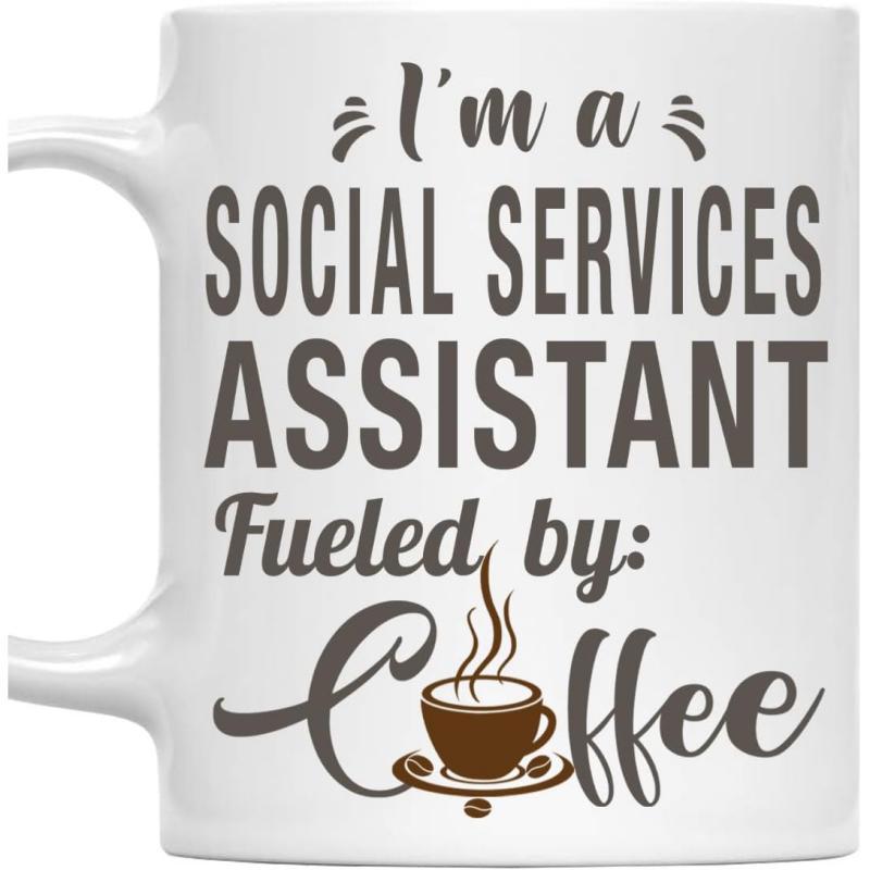 Tailorly White Ceramic 11 oz Mug - Im A Social Services Assistant Fueled By Coffee Elegant Typographic Layout Featuring Steaming Hot Brown Ceramic Saucer And Beans