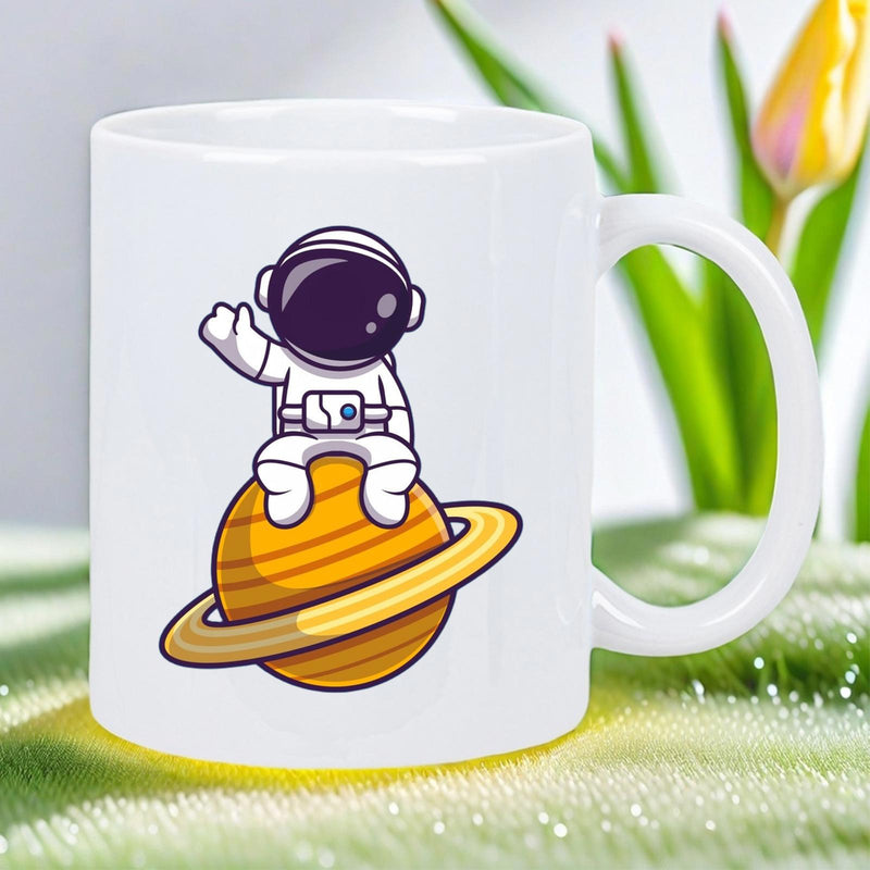 Tailorly White Ceramic 11 oz Mug - Cute Cartoon Explorer Sitting On Saturn Planet Among Faraway Stars Astronaut