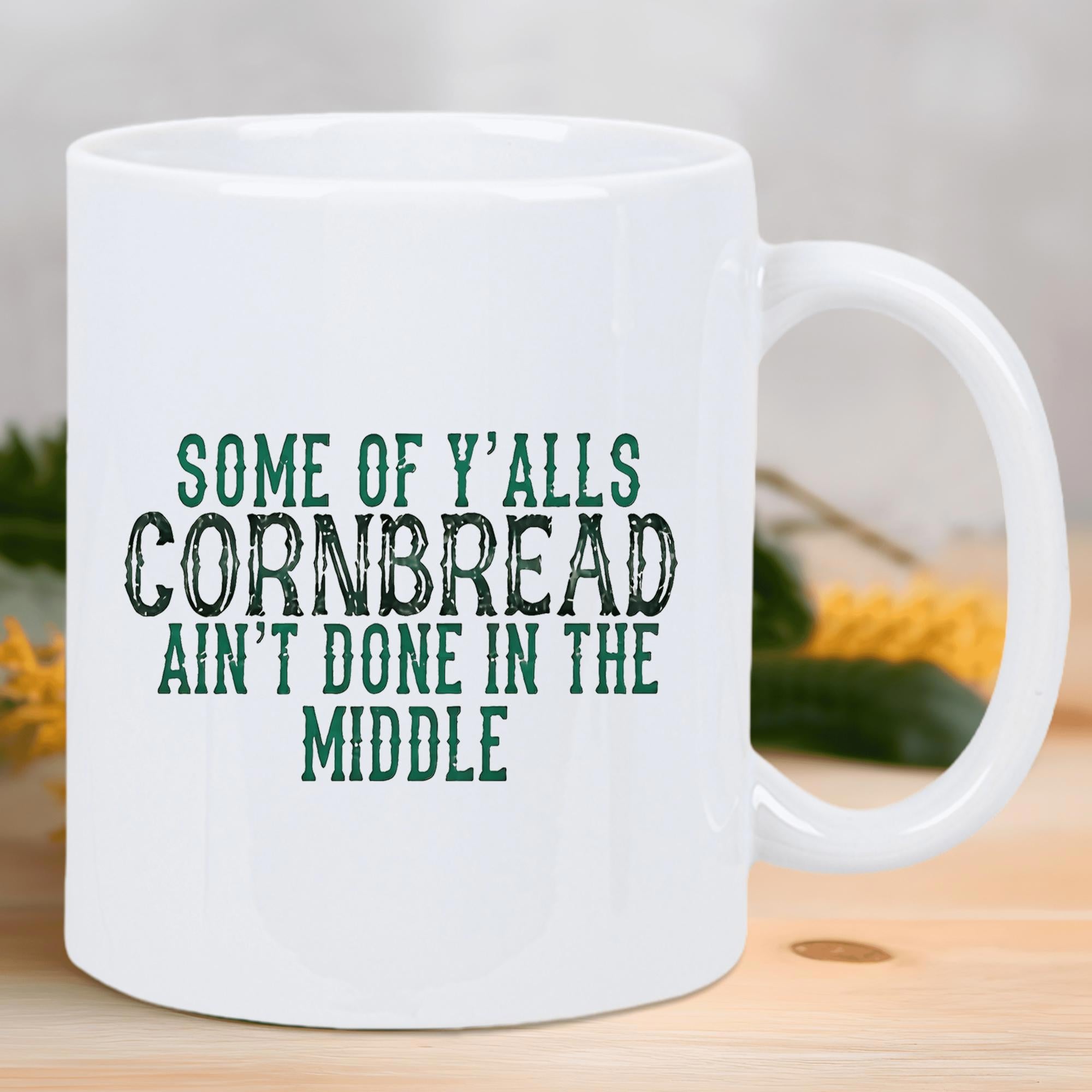 Tailorly White Ceramic 11 oz Mug - Some Of Yalls Cornbread Aint Done In The Middle Cylindrical White Ceramic Vessel With Smooth Glossy Finish And Curved Handle Mug