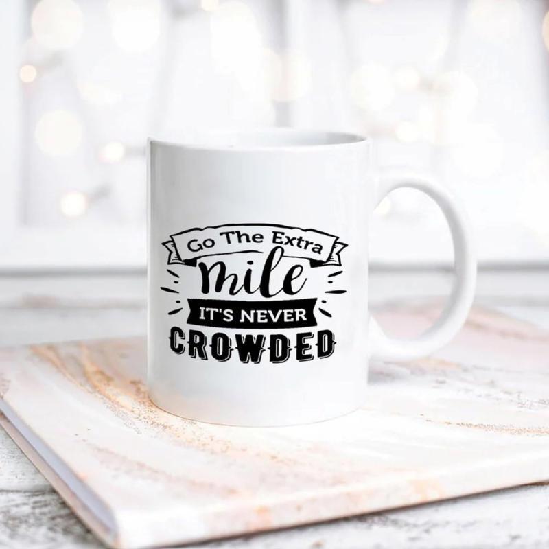 Tailorly White Ceramic 11 oz Mug - Go The Extra Mile It's Never Crowded Bold Motivational Typography Featuring Stylized Script And Decorative Ribbon Banners Quote