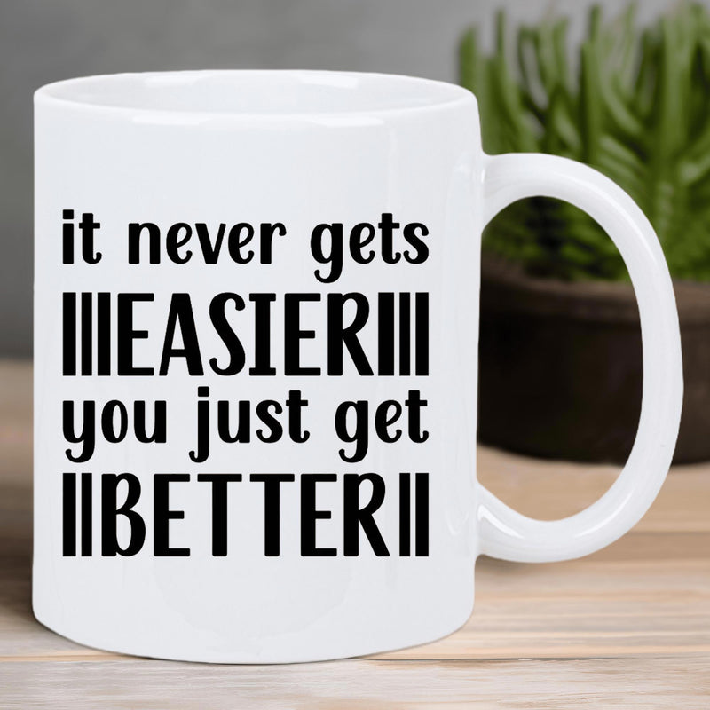 Tailorly White Ceramic 11 oz Mug - It Never Gets Easier You Just Get Better Minimalist Black Typography On Pure Motivational Quote Mug