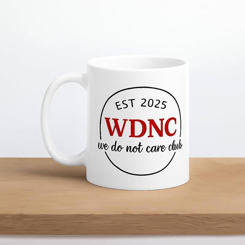 Tailorly White Ceramic 11 oz Mug - EST 2025 WDNC We Do Not Care Club Minimalist White Ceramic Vessel Featuring A Circular Badge Design Style Mug
