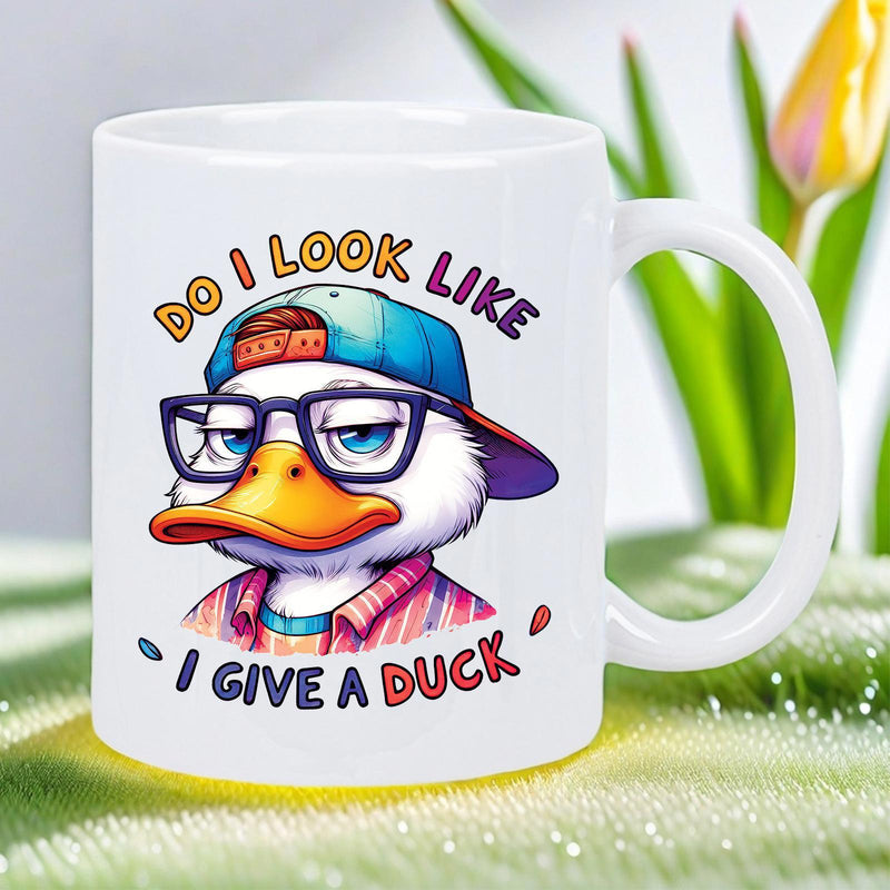 Tailorly White Ceramic 11 oz Mug - Do I Look Like I Give A Duck Cool Cartoon Wearing Backward Baseball Cap And Stylish Thick Rimmed Glasses Duck